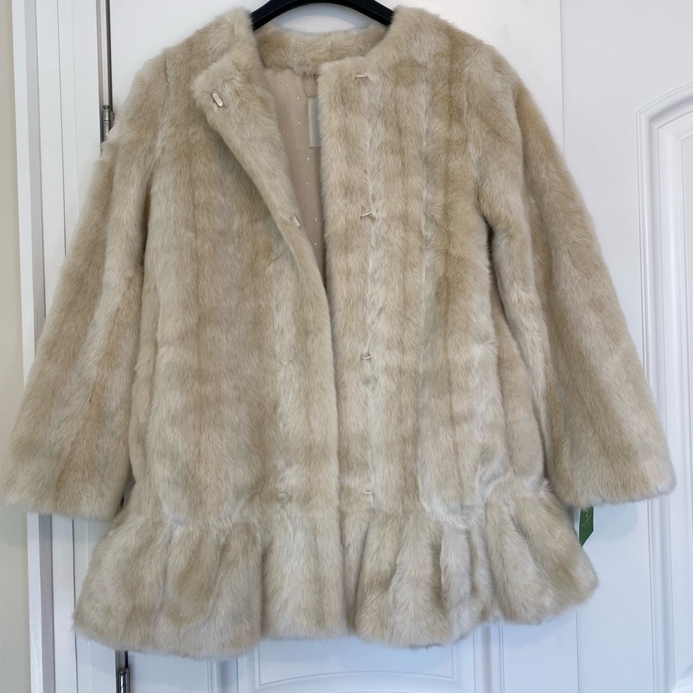Luxurious faux fur cream/carmel colored coat! New with tags. It is beautiful!